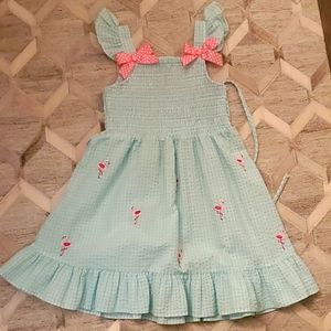 Rare Editions turquoise blue gingham dress with flamingo embroidery.